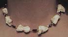 Human Wrist Bone and Garnet Necklace