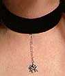 Black velvet choker with spider
on chain
